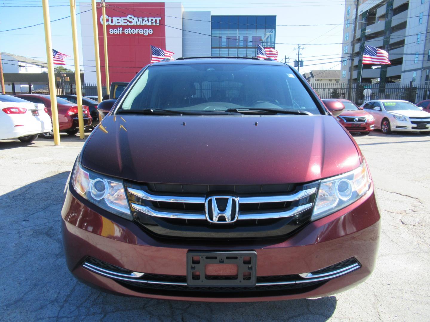 2016 Red /Tan Honda Odyssey EX-L (5FNRL5H62GB) with an 3.5L V6 SOHC 24V engine, Automatic transmission, located at 1511 North Shepherd Dr., Houston, TX, 77008, (281) 657-1221, 29.798361, -95.412560 - 2016 HONDA ODYSSEY EX-L VIN: 5FNRL5H62GB103369 5 F N R L 5 H 6 2 G B 1 0 3 3 6 9 VAN 3.5L V6 F SOHC 24V GASOLINE FRONT WHEEL DRIVE - Photo#33